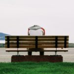 man sitting alone on a bench potts lawyers